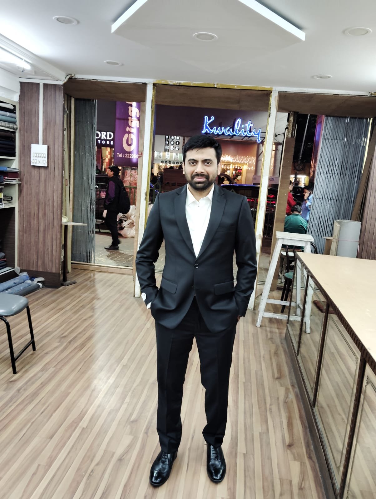 Classic Black 2-Piece Bespoke Dinner Suit Final Client Fitting in Showroom